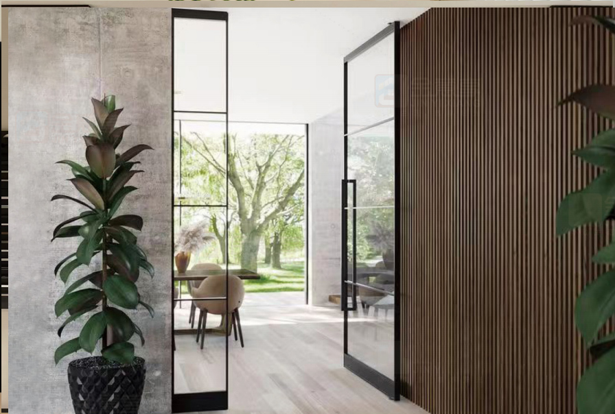 Interior black aluminum sliding glass barn door separating dining room and living space.