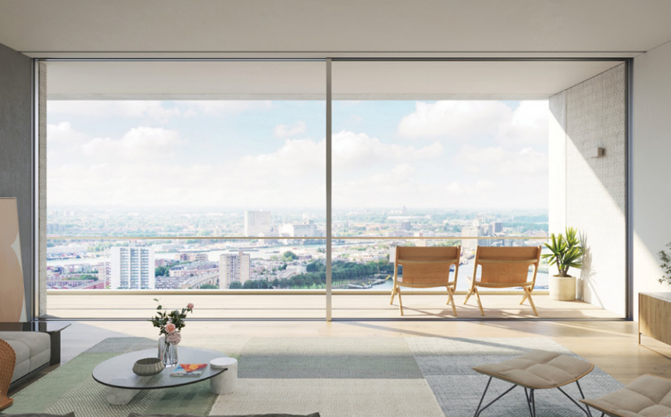 Luxury hotel suite featuring commercial-grade aluminum sliding doors at dusk with city views.